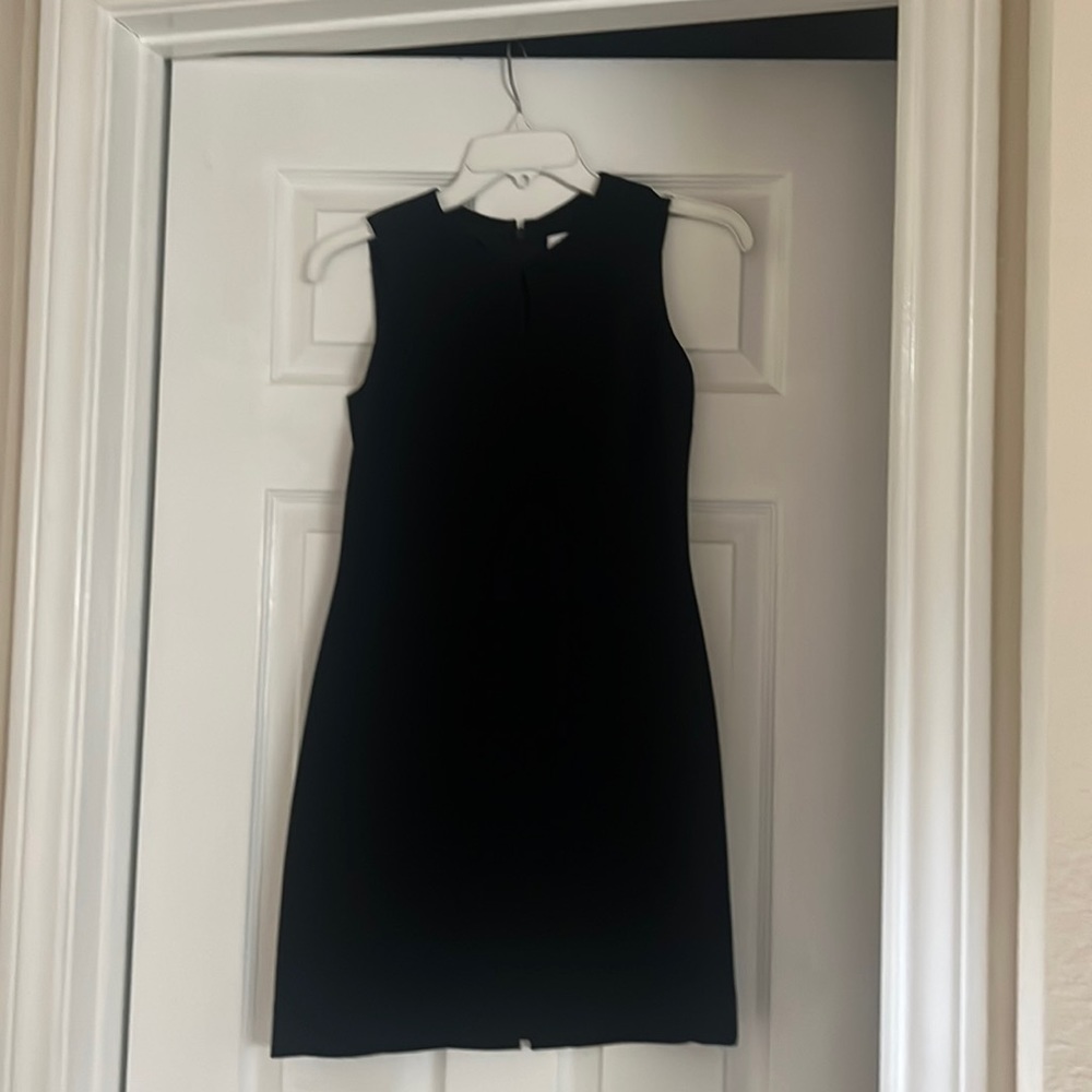 Beautiful sheath dress with keyhole neck line. Perfect condition.
